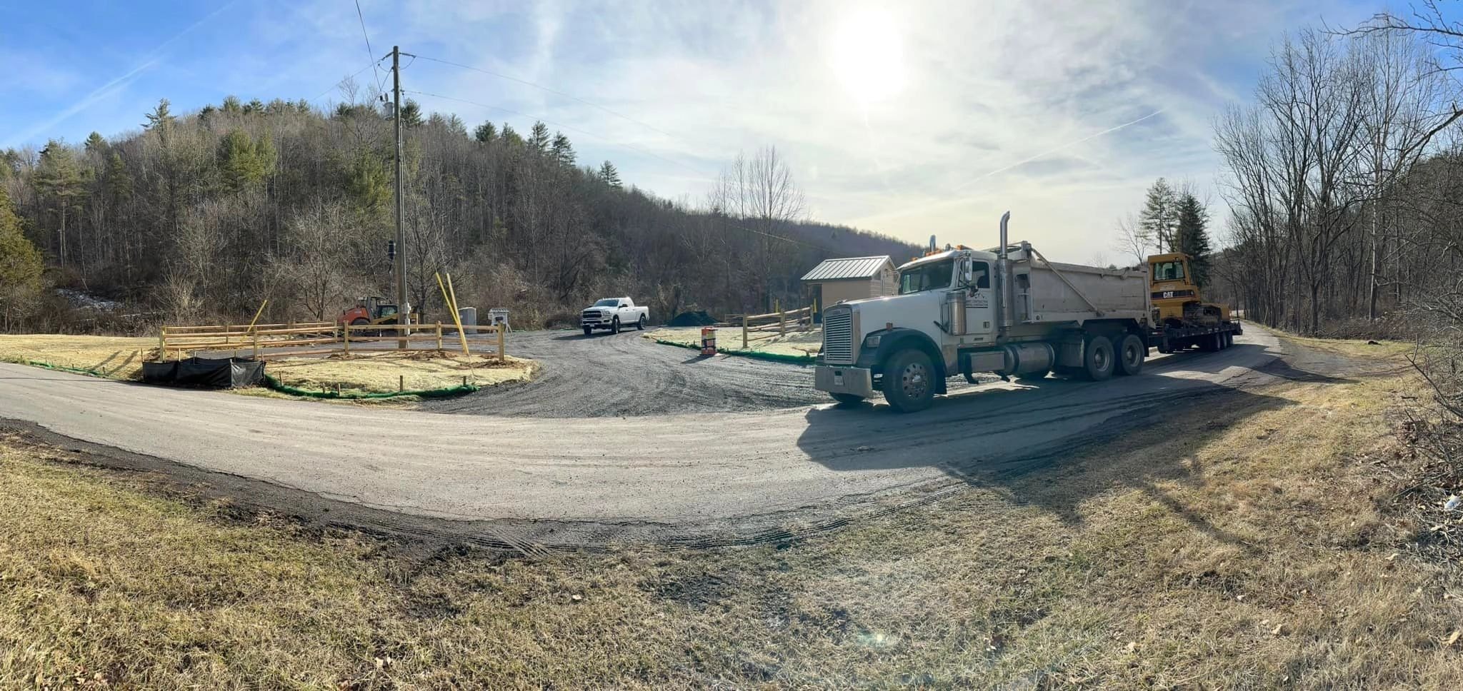 Summit Contracting history — dump truck at construction site